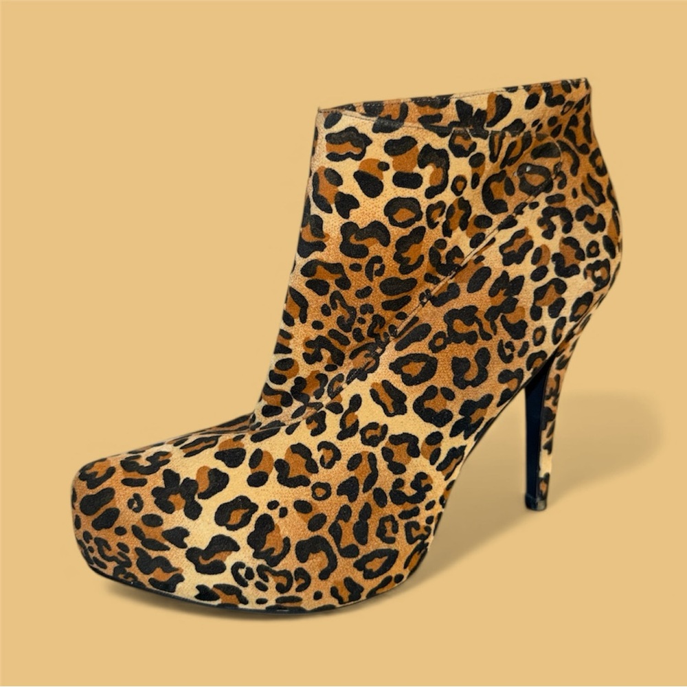Charlotte Russe cheetah print heeled boots size 10. Please read